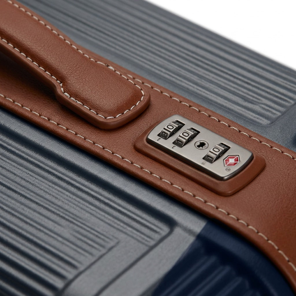 Macro view of a Bugatti Wellington carry-on featuring a TSA lock and brown vegan leather trim.