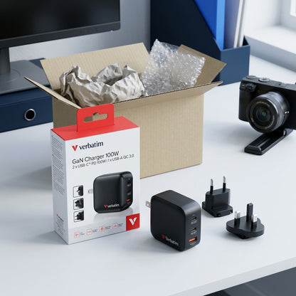 Verbatim 100W Mini GaN Charger unboxed with retail packaging and EU/UK travel plug adapters.