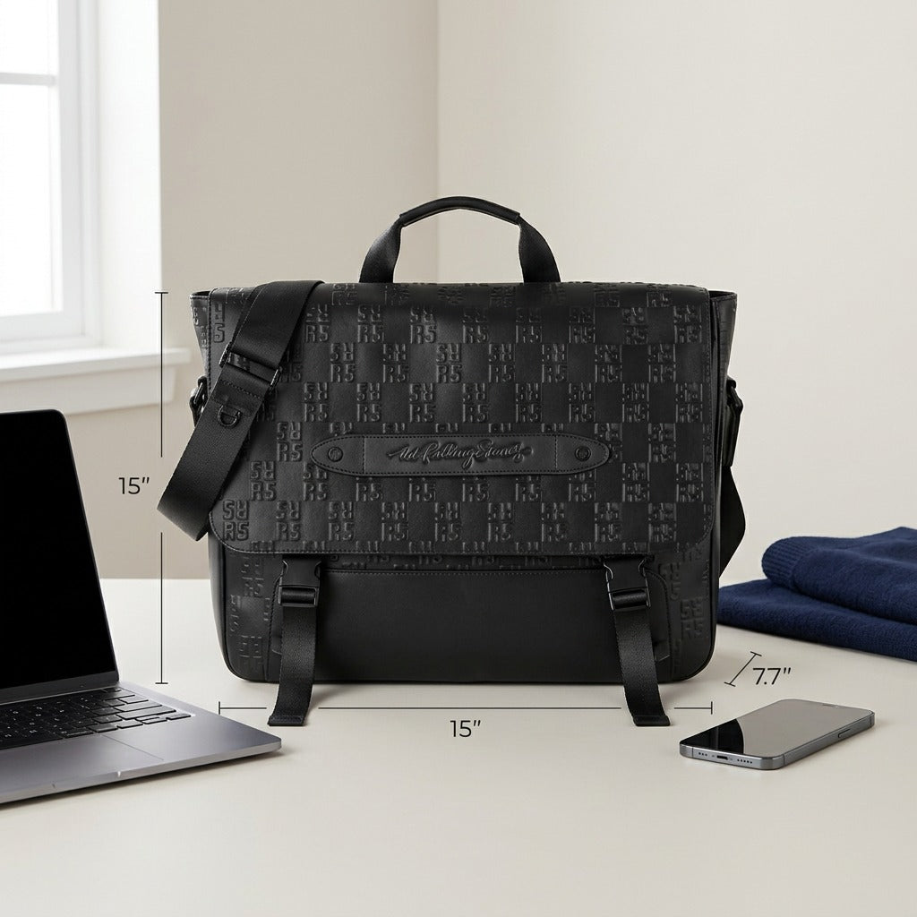Bugatti Rolling Stones black leather messenger bag shown with dimensions beside a laptop and phone.