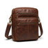 Brown top-grain Mancini leather unisex bag with brass hardware and multi-zip organizer pockets.