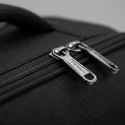 Macro detail of the Travelpro Maxlite 5 Underseat Bag showing durable zipper pulls and black fabric.